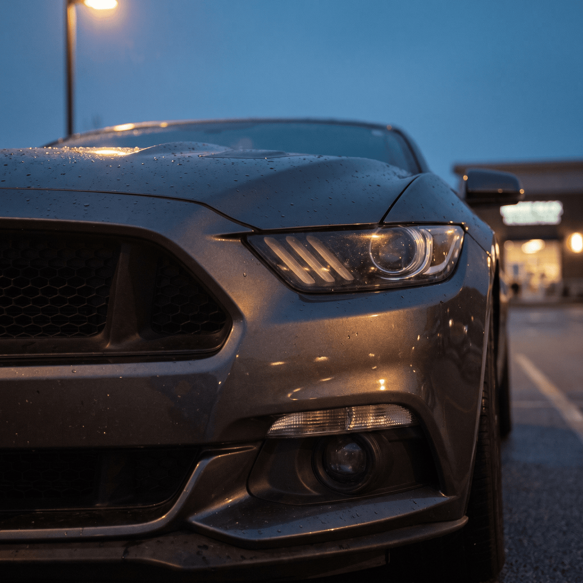 Ford Mustang LED headlights with diagonal light bars and projector lens