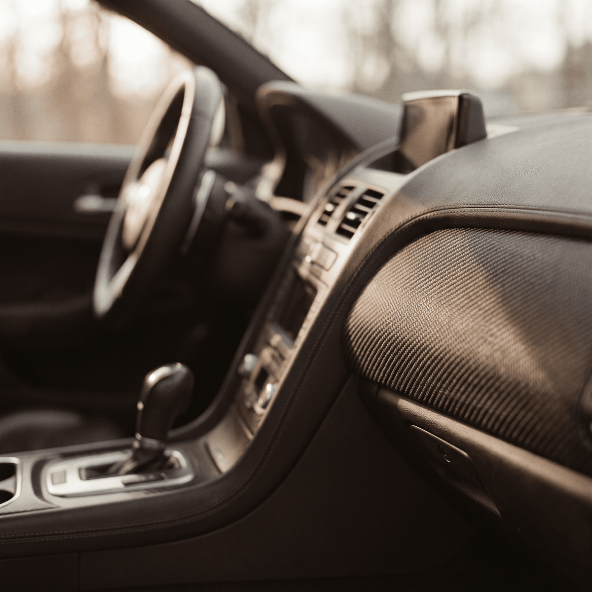 Black carbon-fiber style interior trim for car dashboard dress-up
