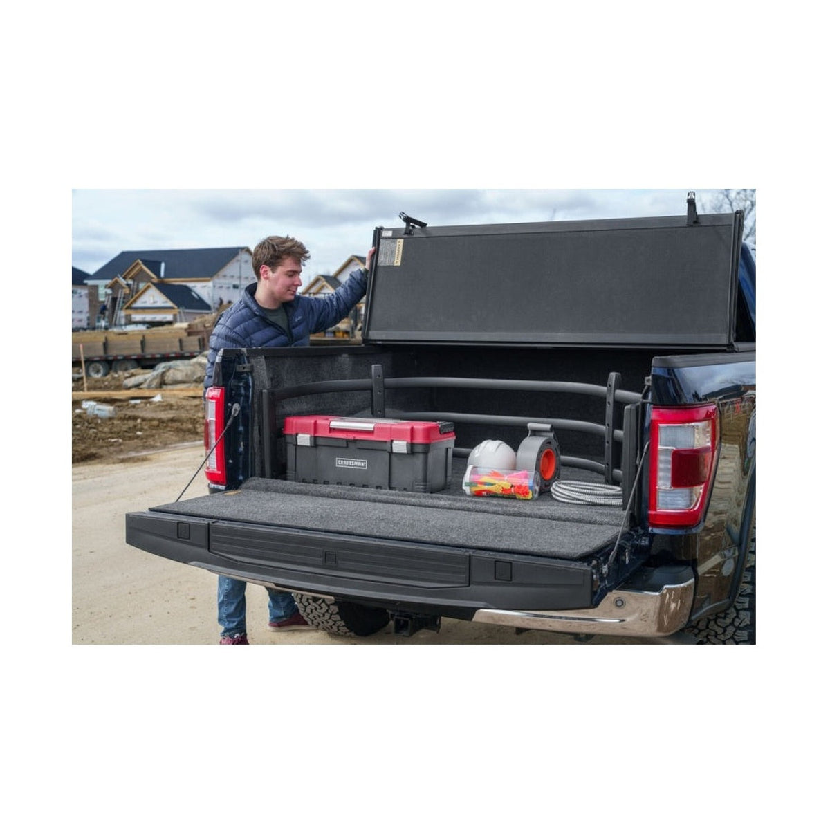 AMP Research AMP Research 04-22 Ford F-150 BedXtender HD Sport - Black (Optional No-Drill Brkt 74602-01A), installed
