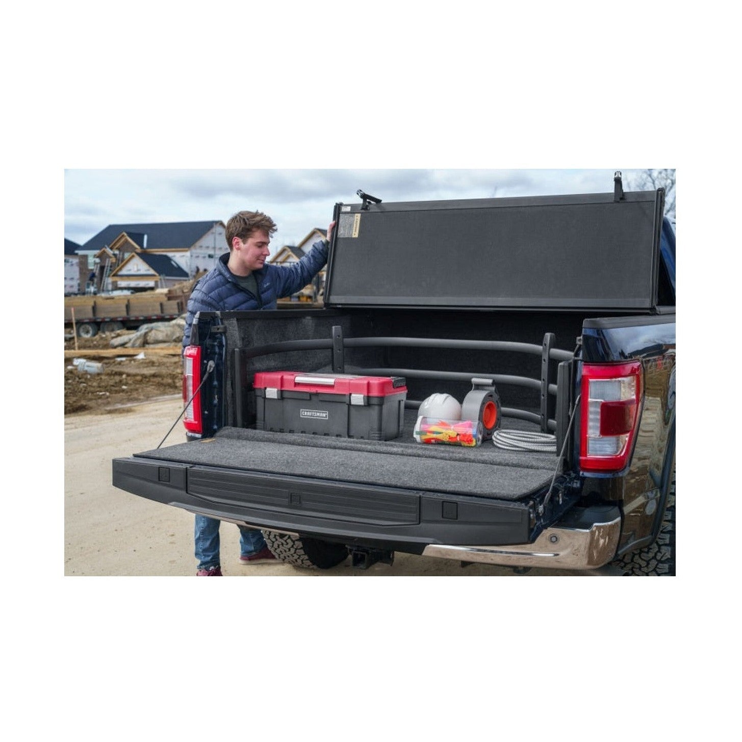 AMP Research AMP Research 04-22 Ford F-150 BedXtender HD Sport - Black (Optional No-Drill Brkt 74602-01A), installed