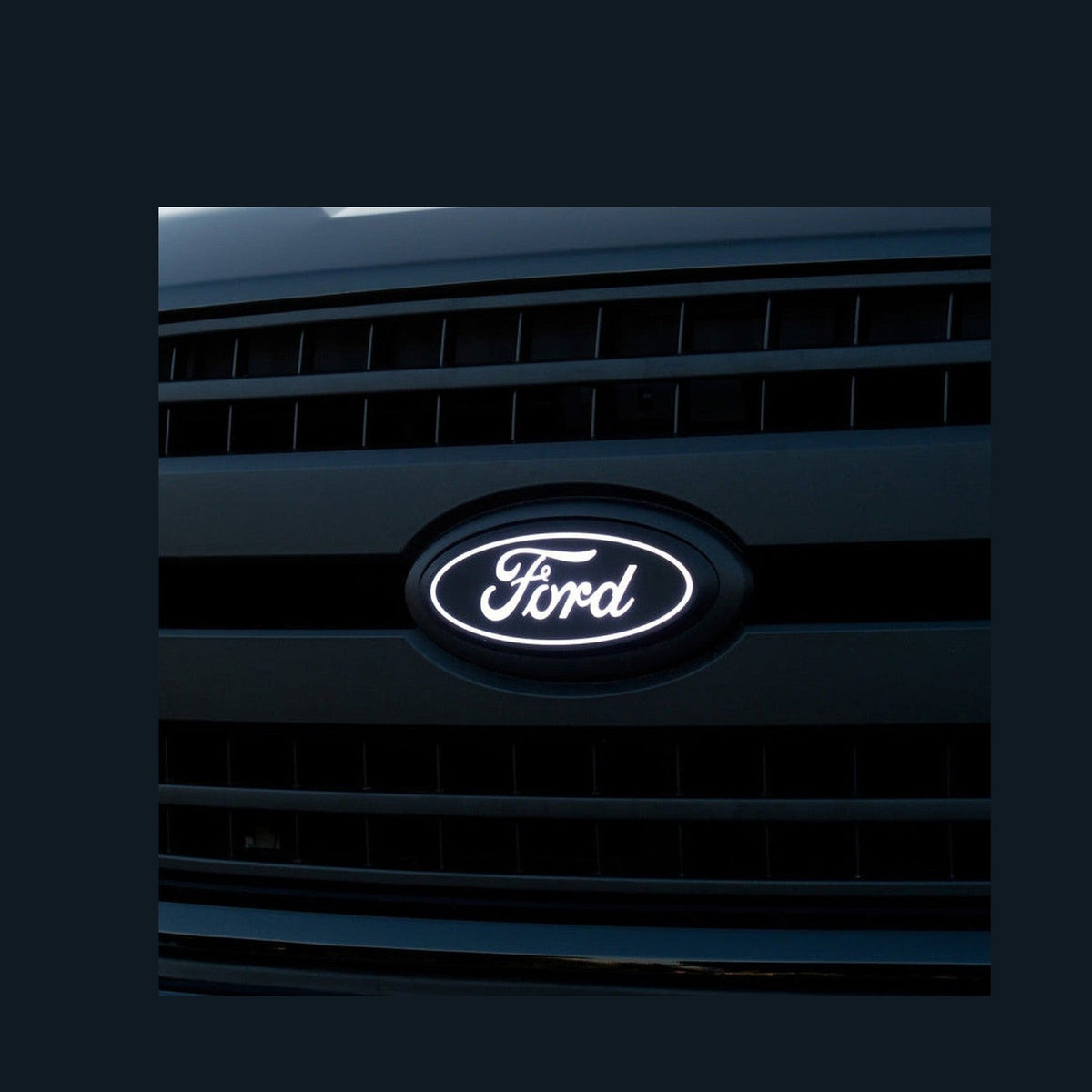Putco Putco 2023 Ford F-150 Front Luminix Ford LED Emblem - w/Camera CutOut w/o Spray Washer, installed