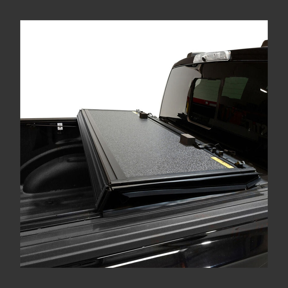 Westin Westin 15-26 Ford F-150 5ft. 7in. Bed Hard Tri-Fold Tonneau Cover - Black, installed