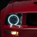 Raxiom 05-09 Ford Mustang GT V6 Axial Series CCFL Halo Projector Headlight- Blk Housing (Smkd Lens)